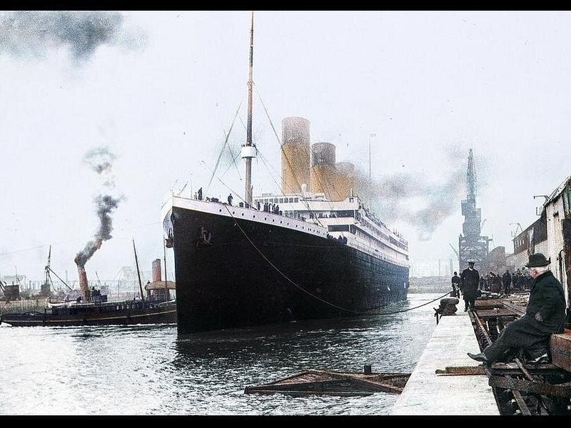 Titanic under way from Southampton with tugs alongside, April 1912