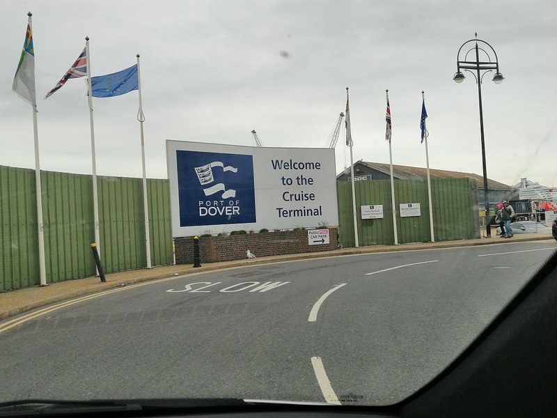The Welcome to the Cruise Terminal sign on the approach road into the docks